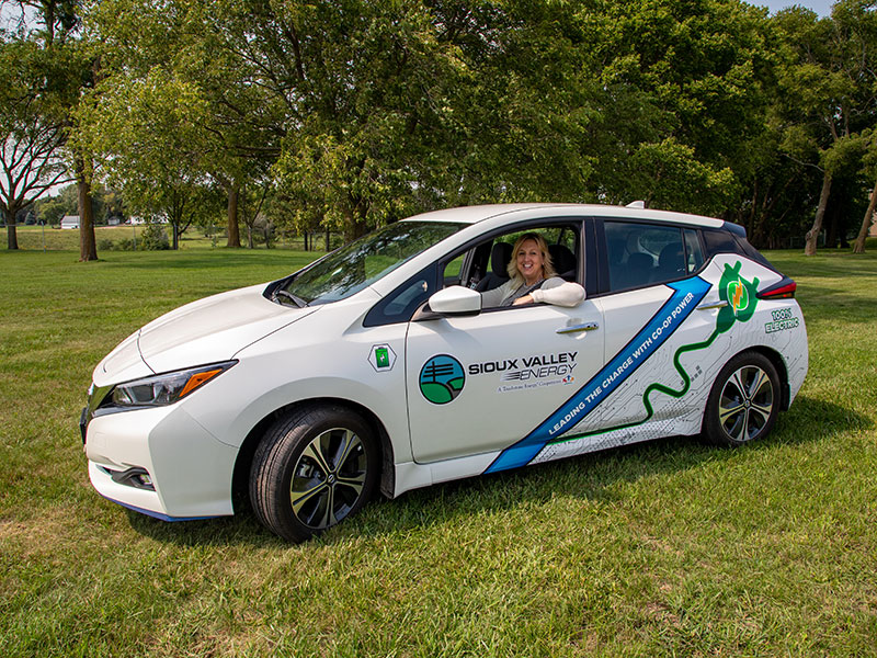 Woman in electric car