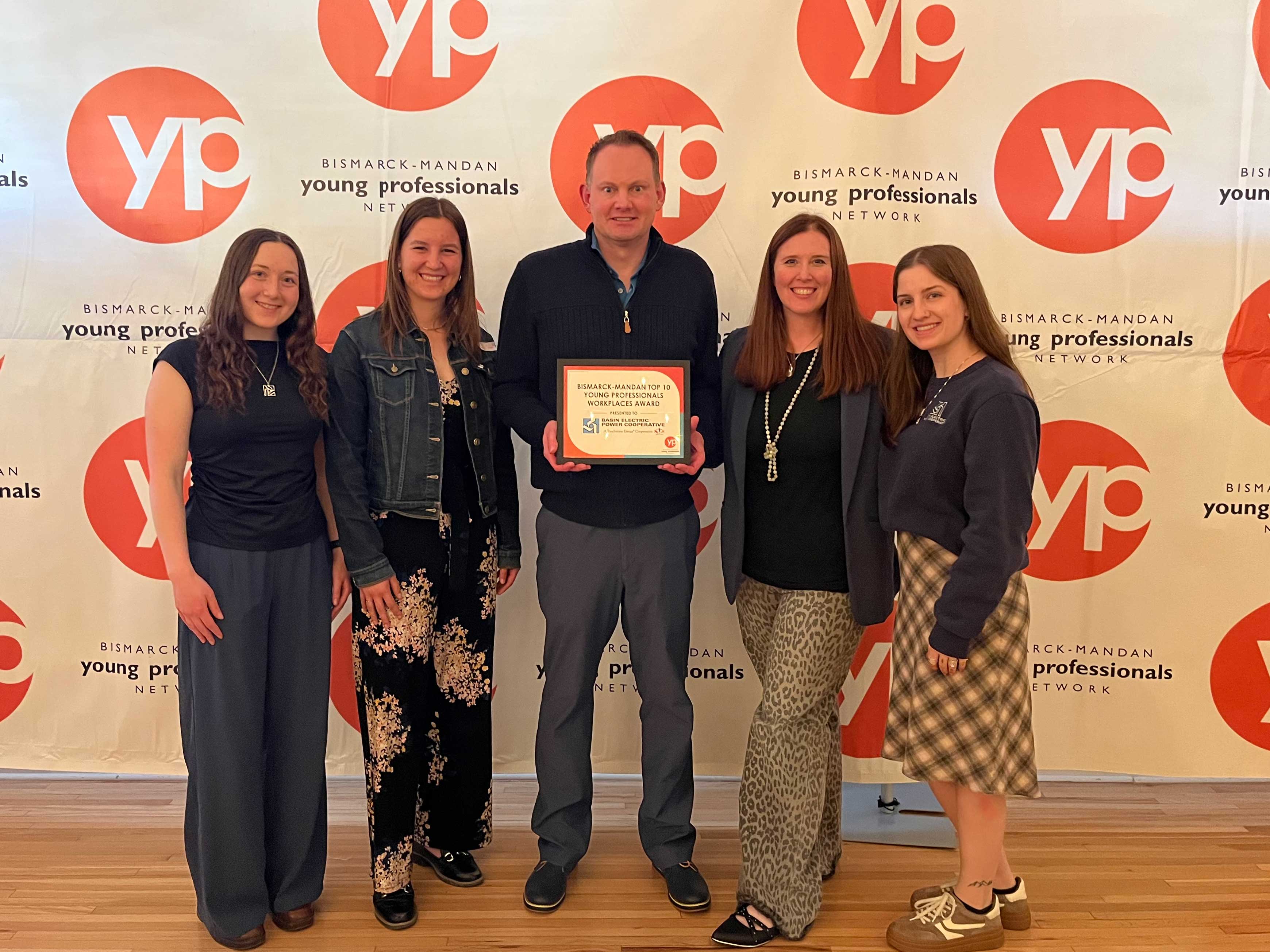 Basin Electric employees holding Young Professionals Network's Top Ten Places to Work award