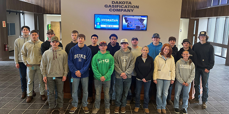 Interns pose as a group at Dakota Gas