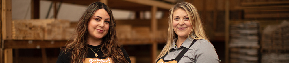 two women standing in hardware store