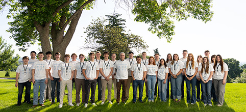 Interns in matching white tshirts