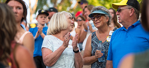 Employees at a baseball game