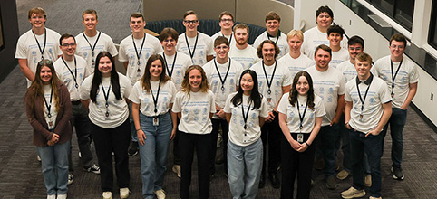 Interns in matching white tshirts