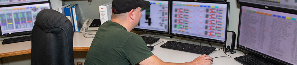 worker at computer screens