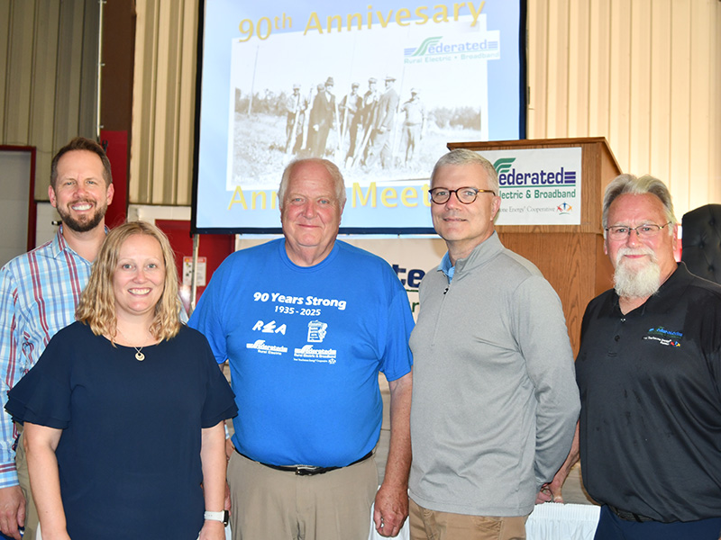 Members of Basin Electric’s executive team celebrate Federated’s 90th anniversary with Basin Electric board member and District 2 representative Dave Meschke and Federated’s General Manager Scott Reimer.