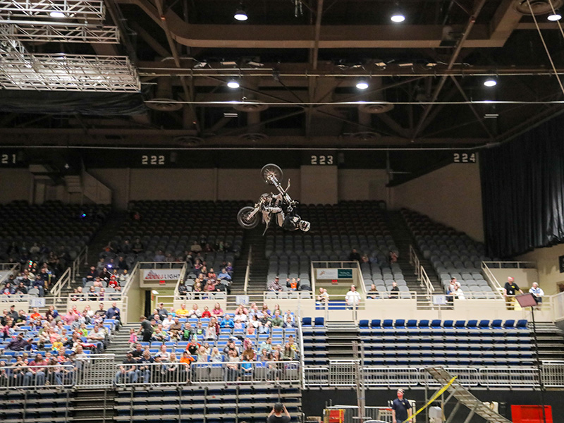 motorcycle flipping in air in circus